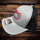Side view of Richardson 112 hat with gray front, black mesh back, red flag and blue buffalo embroidery – AFG stitched above.